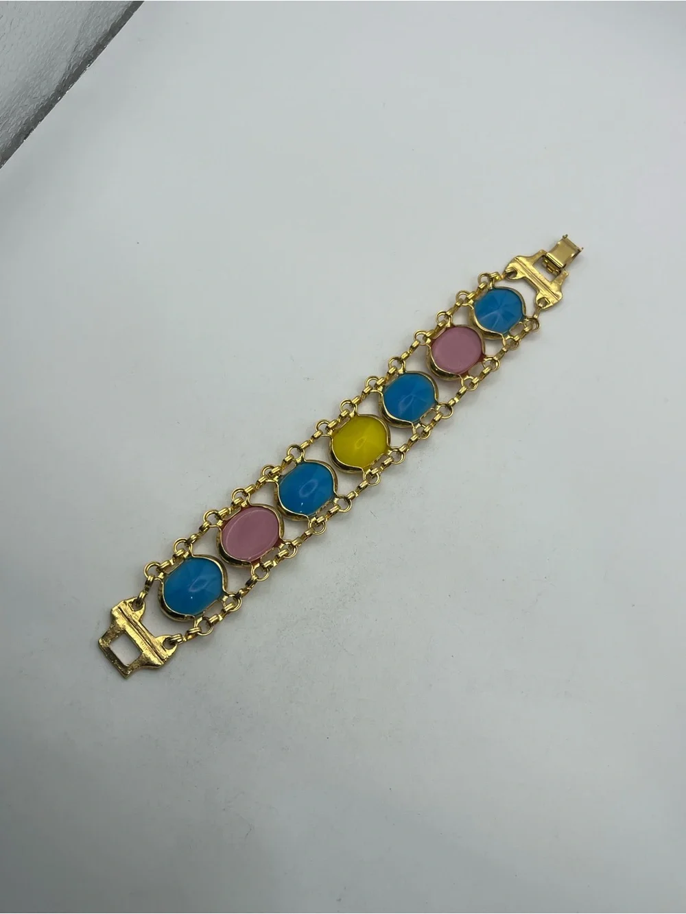 Pale Pink, blue, yellow oval cabochon gold tone vintage chain bracelet